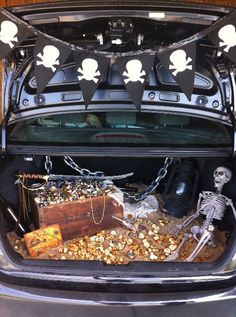 the trunk of a car decorated with halloween decorations