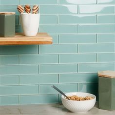 a bowl of cereal sits on a counter