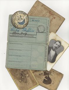 several old papers with pictures on them