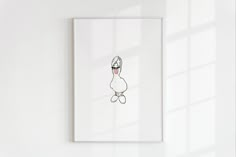 a drawing of a duck with sunglasses on it's head is hanging up against a wall