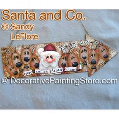 a santa and co sign hanging on a wall