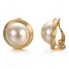 PRICES MAY VARY. Size as picture shown. The Clips on Earrings Diameter about 0.71inches, Exquisite Round plating gold pearl small ear clip, 10 years jewelry design,Natural pearl earrings simple fresh and elegant,bring really temperament Pearl Clips Diameter about 0.7inches, Round shaped clip earrings with white dome pearl,Italian design style synchronization, simple, stylish, low-key luxury. 18 mm white freshwater cultured pearl Clip earrings are truly a fashion classic and a perfect addition to 1950s Jewelry Style, Non Pierced Earrings, 1950s Jewelry, Natural Pearl Earrings, Ivory Earrings, Cartilage Earrings Hoop, Ivory Pearl, Cross Earrings, Pretty Earrings