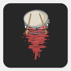 a drum with two sticks sticking out of it's body in the middle of water