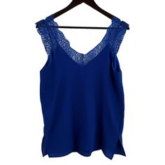 Umgee Blue Lace Trim Sleeveless Top Size Small New. Solid Blue Crepe Feel Fabric Lined Lace Trim New With Tags Armpit To Armpit 19" Length 28" Blue V-neck Vest Top, Blue Spaghetti Strap Vest Top, Blue Cami Tank Top, Blue Sleeveless Camisole For Summer, Blue Sleeveless Summer Vest, Blue Tank Vest For Summer, Blue Summer Vest, Blue Stretch Cami Tank Top, Blue Stretch Sleeveless Vest