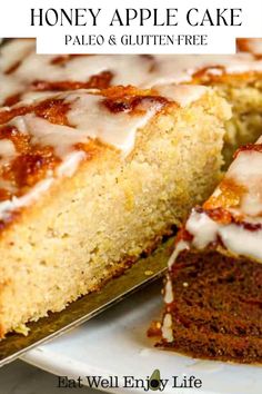 a close up of a cake on a plate with a slice cut from it and the text overlay reads honey apple cake paleo & glulten - free