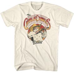 PRICES MAY VARY. COUNTRY HITS AND STYLE! Charlie Daniels American country singer-songwriter apparel. Dance and sing along to The Devil Went Down to Georgia while wearing this comfy country music t shirt YEP, IT'S OFFICIAL! Our cool graphic t shirts are 100% authentic and officially licensed. These super comfy tees are designed and printed in the USA by American Classics, a leader in high-quality retro, vintage style apparel since 1994 HIGH QUALITY CLOTHES, COMFY & COOL 100% cotton soft short sle Devil Went Down To Georgia, Charlie Daniels Band, Music T Shirt, Charlie Daniels, Country Hits, Band Logo, Band Merchandise, Band Logos, Cool Graphic Tees