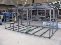 a metal structure is being constructed in a garage