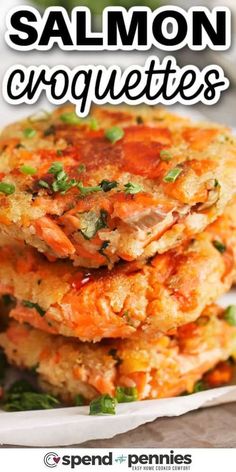 three crab cakes stacked on top of each other with text overlay that reads salmon croquettes