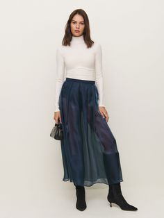 Wear the skirt. Shop the Zarina Skirt from Reformation, a sheer high-rise midi skirt with pleated panels. Tanna Midi Skirt, Zara Evening Midi Skirt, Reformation Skirt, Reformation Zoe Skirt, Reformation Denim Skirt, Work Wear Outfits, Vintage Inspired Dresses, Half Zip Pullover, Flowy Skirt