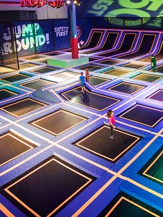 children playing in an indoor trampoline park