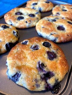 blueberry muffins sitting on top of a baking pan with the words low carb blueberry muffin