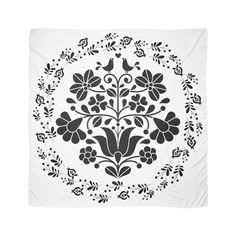 a black and white floral design on a blanket