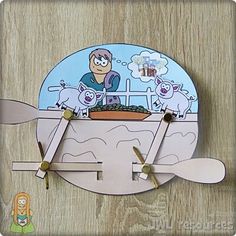 a clock made to look like a cartoon character with sheep in the boat on it