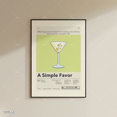 a simple flavored drink poster hangs on the wall in an empty room with white walls