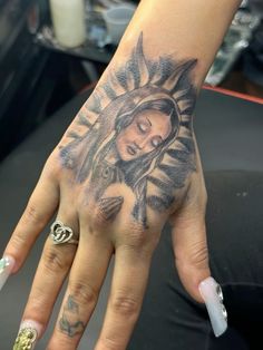 San Judas Hand Tattoo, Hand Tattoos For Women Meaningful, Virgen Mary Tattoo For Women, Mary Hand Tattoo, Virgin Mary Hand Tattoo, Our Lady Of Guadalupe Tattoo, Hispanic Tattoos For Women, Face Hand Tattoo, Thug Tattoos For Women