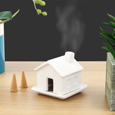 Transform your home into a cozy retreat with this whimsical house incense burner!  Sandalwood scents, a playful chimney, and a miniature getaway await.
https://www.perpetualkid.com/collections/new-just-arrived-gifts/products/incense-house
#HomeDecor #IncenseLover #Relaxation #Unique #Gift #StockingStuffer Best Home Fragrance, Pottery Kit, Butterfly Tea, Sandalwood Fragrance, Sandalwood Incense, Sandalwood Scent, Diy Pottery, Ceramic Houses, Incense Holders