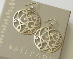 "Silpada 925 Sterling Silver Scroll Earrings W2137. Earrings are approximately 2\" long on French wires.  Can be found in the New 2011-2012 Catalog page 66C.  Excellent Condition. Very shiny silver and easy to wear!" Round Circle, French Wire, Put A Ring On It, Shiny Silver, Sterling Silber, Favorite Jewelry, Jewelry Earrings Dangle, Dangle Drop Earrings, Porter