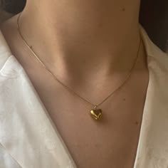 "Puffed Mini Heart Necklace in Gold ✨ Fully stainless steel & tarnish proof! (18k gold plated) 16\" with a 2\" extender Snake chain style featuring a mini gold puffed heart pendant 🤍 The heart measures 1cm x 1cm Handmade with love!" Puffed Heart Necklace, Mini Heart Necklace, Pretty Jewelry Necklaces, Mini Gold, 3d Heart, Puffed Heart, Dope Jewelry, Gold Heart Necklace, Classy Jewelry