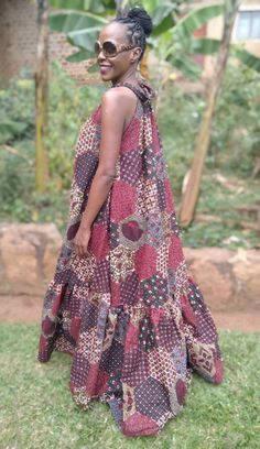 "If you're looking for an elegant African print dress for a special occasion, then this A-line maxi dress is for you. It has a bias cut A line bodice with an extravagant flounce at the bottom. Made in 100% cotton fabric.  Available in Large size. Full dress length 60\". Halter neck with strap ties. No pockets. It fits up to bust measurements 45 inches.  Kindly note that due to variations in computer monitors, tablets and/or mobile device settings, actual fabric colours may slightly differ from t Flowy A-line Bohemian Maxi Dress, Bohemian A-line Maxi Dress With Ruffles, Printed A-line Maxi Dress, Multicolor Ruffled Floor-length Maxi Dress, Flowy Printed Floor-length Maxi Dress, Flowy Multicolor A-line Maxi Dress, Flowy Floor-length Printed Dress, Flowy Patterned Printed Maxi Dress, Flowy Patterned Maxi Dress