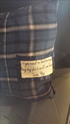 a pillow with a note attached to it