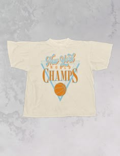 Show the love for your favorite team in this New York Basketball oversized tshirt that is inspired by vintage 90s NBA tshirts!- Features the words "New York World Champs" with a retro basketball design all in orange and light blue ink- Screen print transfer that is heat pressed onto each tshirt- Tshirt is a super soft vintage wash that gets softer after each wash- Oversized fit- Sizing translation: XS/S = L , S/M = XL , L/XL = 2XL , 2XL/3XL = 3XL- Size up if you want a tshirt dress fit- 100% Cotton**due to screens & filters color may vary from pictures** Basketball Tshirts Designs, Cute Team Shirts Design, Athletic Tshirt Designs, Vintage Tshirt Design Ideas, Vintage Team Shirts, Sport Tshirt Designs Ideas, Sports Graphic Tees, Dance Team T Shirt Designs, Elementary Shirts