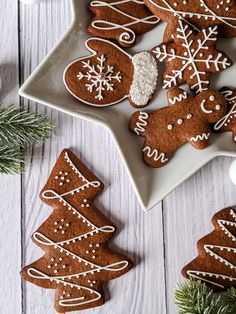 christmas cookies decorated with icing on a plate