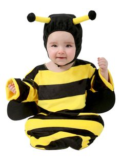 a baby dressed in a bee costume