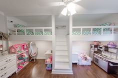 a room with bunk beds and other furniture