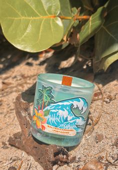 Shark Tooth Candle Salted Caramel & Pistachio Soy Wax Wood Wick Tropical Scented Wave Ocean Iridescent Blue Beach Hawaiian Floridian Decor Summer Gift  Introducing our Shark Tooth Candle, a unique blend of Salted Caramel & Pistachio crafted from premium soy wax with a crackling wood wick. This tropical-scented candle is housed in an iridescent blue vessel that evokes the mesmerizing waves of the ocean. These fossilized shark teeth are handpicked in Sarasota, Florida. Perfect as a summer gift or Beachy Room Decor, Beach Room Decor, Beach Basket, Beachy Room, Hawaiian Decor, Beach Room, Iridescent Blue, Shark Tooth, Blue Beach