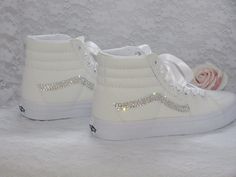 Perfect wedding sneakers to dance the night away in. Very comfortable and super sparkly. Once the day is over, wear them again and again for that added touch of luxury with any outfit. Custom hand embellished platform Old Skool Vans. Embellished with the finest crystals to inner and outer brand panels and finished with luxurious satin ribbon lace ties. These can be personalised on request and ribbon colour changed to compliment your colour scheme. Please just ask. As with all our ranges, if you wish to modify a design we can work with you to cater for your individual requirements. All shoes are authentic and made to order. **PLEASE NOTE** Orders are taken in UK sizes. An International Converse sizing conversion chart is included in the listing for reference. Please make sure you order your Vans Wedding, Crystal Sneakers, Bling Sneakers, Wedding Vans, Tennis Vans, Bridal Sneakers, Old Skool Vans, Tenis Vans, Wedding Converse