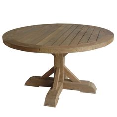 a round wooden table with four legs