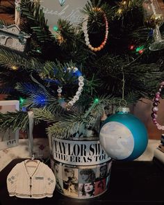 a christmas tree with ornaments on it and an ornament