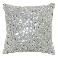 a decorative pillow with silver sequins on the front and back, it is made from