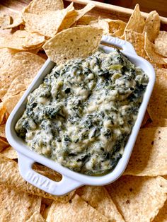 spinach dip with tortilla chips on the side