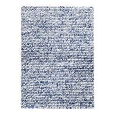 a blue and white rug on a white background