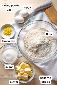 ingredients to make an egg muffin recipe on a wooden table with flour, sugar and eggs