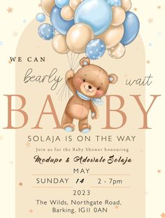 a baby shower with balloons and a teddy bear