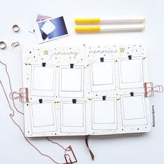 an open planner with the pages lined up and some other items around it on a white surface