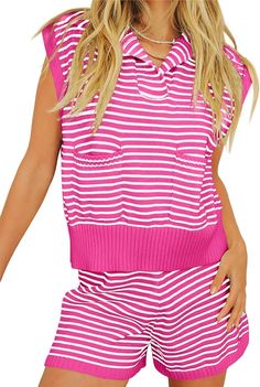 a woman in pink and white striped romper shorts with her hands on her hips