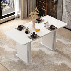 a white table sitting on top of a carpet covered floor