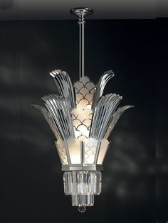 an art deco chandelier hanging from a ceiling