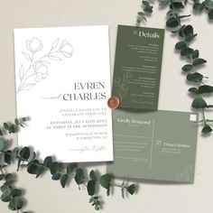 the wedding stationery is displayed with eucalyptus leaves and greenery, along with a wax seal