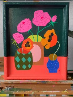 an art work with flowers in vases painted on the side of a wooden frame