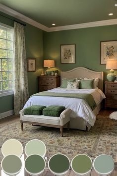 a bedroom with green walls and white furniture