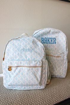 For all my blue girlies, this backpack is the cutest pattern and neutral to get you through the school year!  Has stretchy water bottle pockets on both side, one exterior pocket, interior flap for laptop, ipad, folders and interior zipper pockets! Straps are adjustable and has high quality gold zipper closure.  Nylon material, easy to clean! Comes in mini + standard size! Dimensions:  Mini: 10.8*5*12.8 inch Standard: 11.8*5.3*15 inch Pairs well with our matching pencil pouch & lunchbox! Please allow 10-20 days for custom embroidery turnaround, if you need asap please purchase rush shipping + production! Cute Backpacks For School, School Bag Essentials, Embroidered Backpack, Blue Toile, Cute Nurse, School Collection, Shoes For Leggings, Cute Backpacks, Blue Backpack