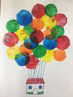 a drawing of a house with colorful umbrellas in the shape of a bunch of balloons