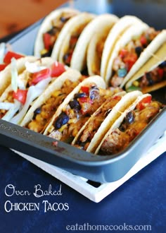 chicken tacos are lined up in a pan on a blue tablecloth with text overlay