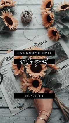 a person holding sunflowers with the words overcome evil with good above them on top of newspaper