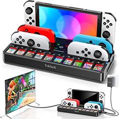 the nintendo wii console is connected to two video game controllers and an entertainment center with games on it