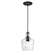 a small glass light fixture hanging from a black metal ceiling fixture with an acrylic bulb